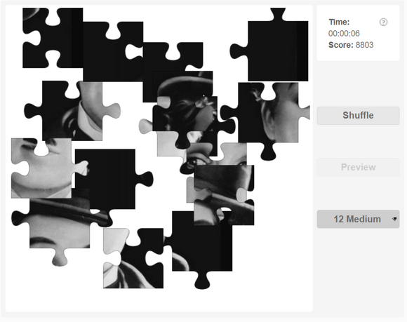 Online jigaw puzzles - Idenfity the famous personality - Charlie chaplin